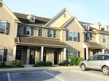 Stonecreek Exterior with Wreaths on Doors